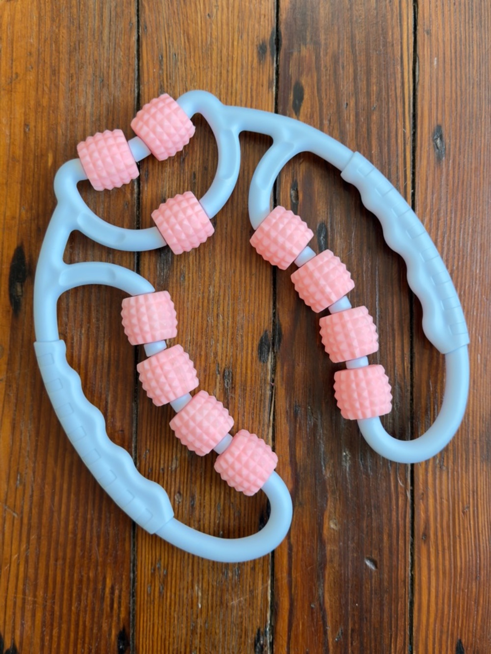 Blue Handheld Massage Roller with Pink Rollers